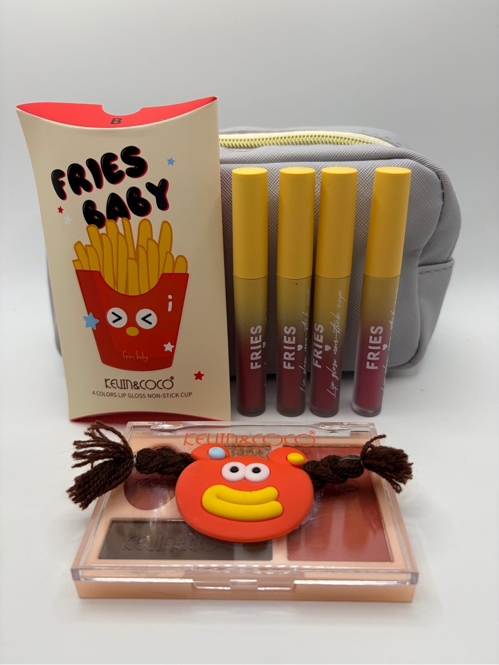 Kevin & CoCo lipgloss with makeup pallet